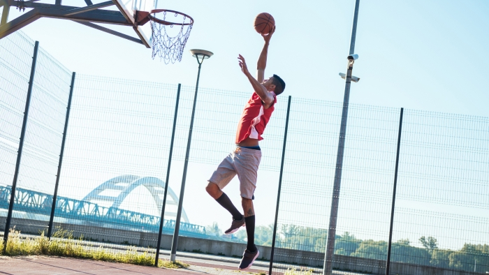 man playing basketball